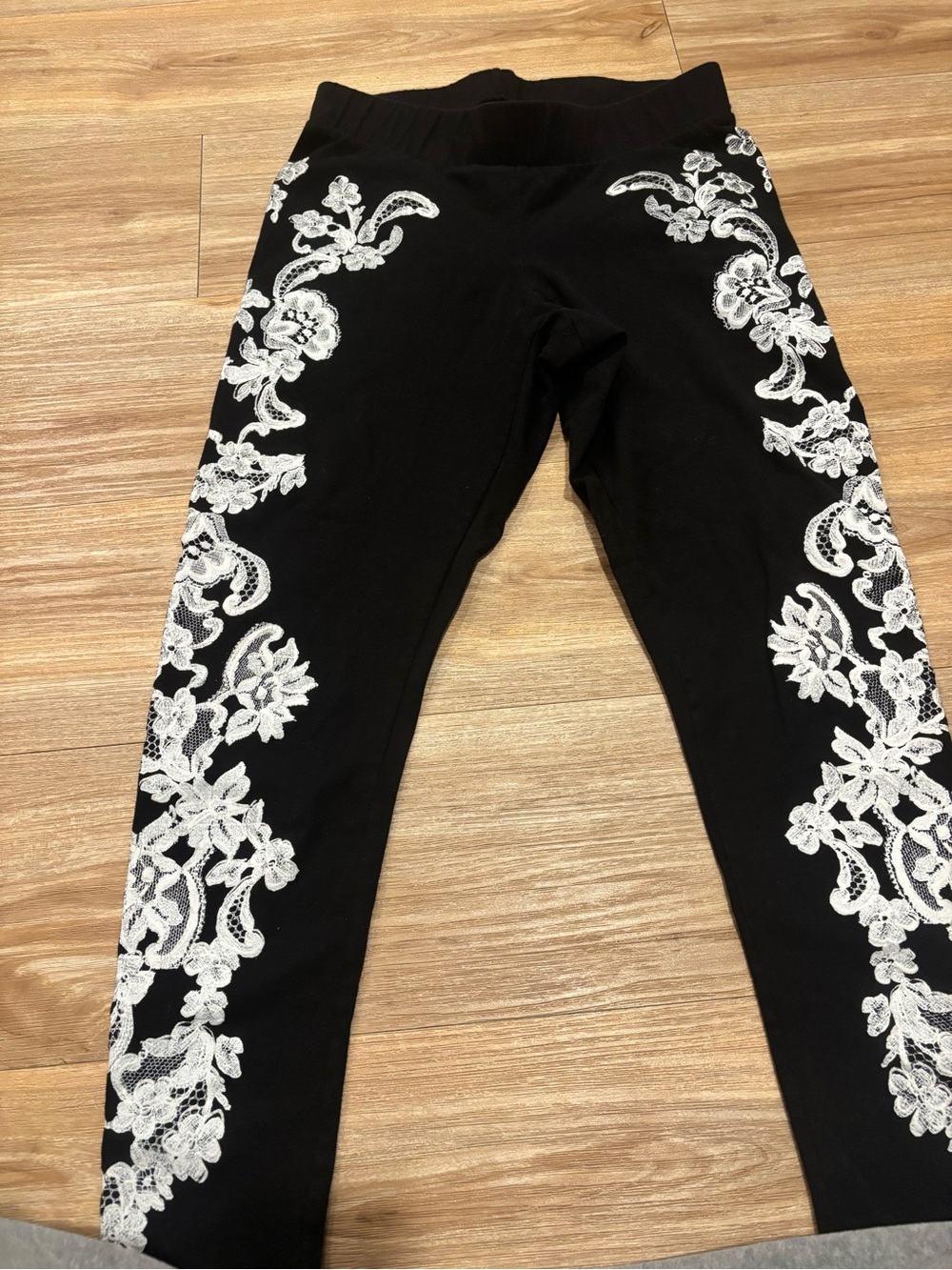 Torrid Black Leggings with White Floral Lace Side Panels